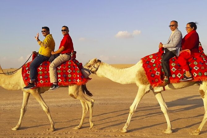 Premium Evening Desert Safari Dubai with Camel Ride & BBQ Dinner - Optional quad biking at the Lahbab stop