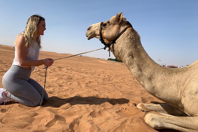Premium Evening Desert Safari, Quad Bike, Camel & VIP BBQ Dinner - Quad biking across the Al Madam sands