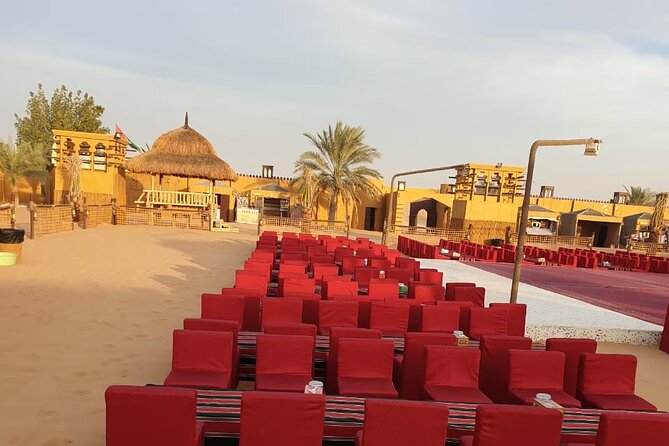 Premium Red Dunes Safari | Camel Ride | Dune Bashing | Sand Ski - Camel ride and sandboarding at camp