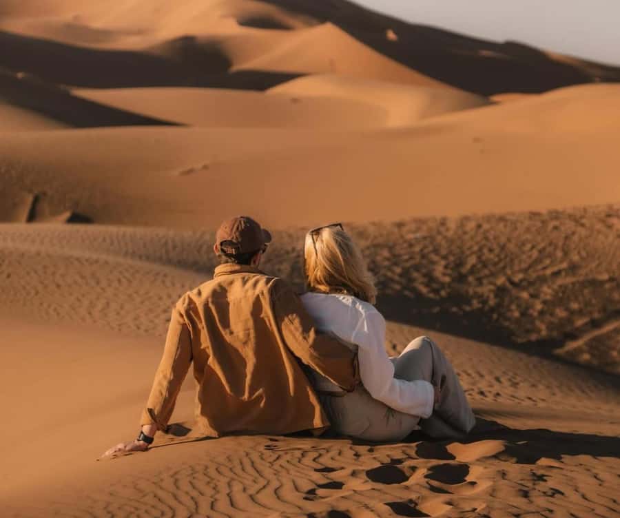 Qatar: Sunset Desert Safari with Camel Ride & Sandboarding - Watching sunset near the Inland Sea