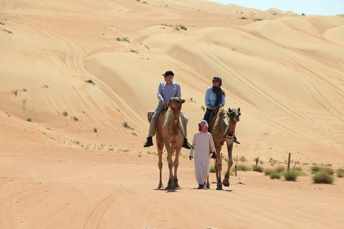 Red Dune Desert Safari with BBQ Dinner, Sand Boarding Dance Shows - Leaving Dubai for the Red Dunes