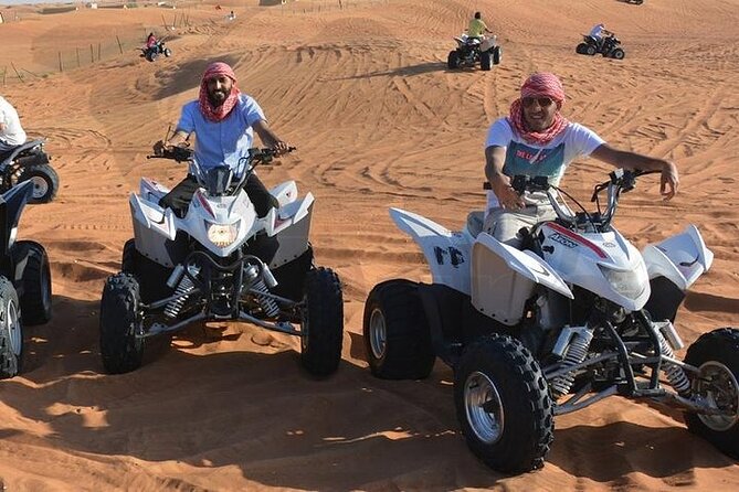Red Dune Evening Desert Safari with BBQ Dinner - Camel riding and sandboarding in the desert