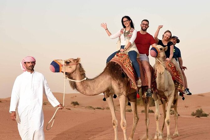 Red Dunes Desert Safari 4x4 Pickup & Drop, Camel Ride BBQ & Shows - Arabic coffee, dates, henna, and costume photographs
