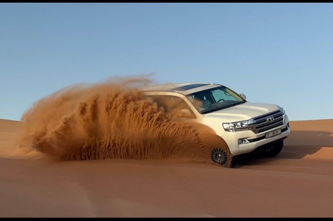Red Dunes Desert Safari Dubai with Dinner Buffet, Show & Transfer - The short camel ride and sand boarding