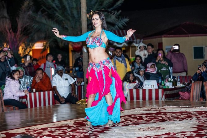 Red Dunes Desert Safari with 4x4 Pick up & Drop, Camel ride, BBQ and Live shows - BBQ dinner and three live shows