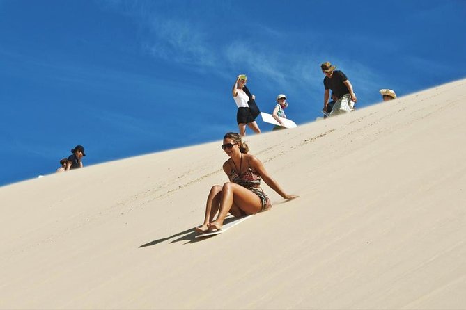 Sharing or Private Safari, Sand Boarding, Camel Ride, inland Sea Quick swim - Sandboarding is short, simple, and good fun