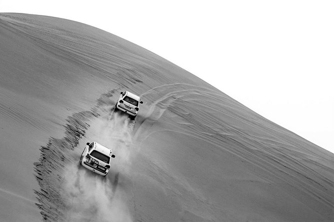 Sharing or Private Safari, Sand Boarding, Camel Ride, inland Sea Quick swim - The Inland Sea is the special feature