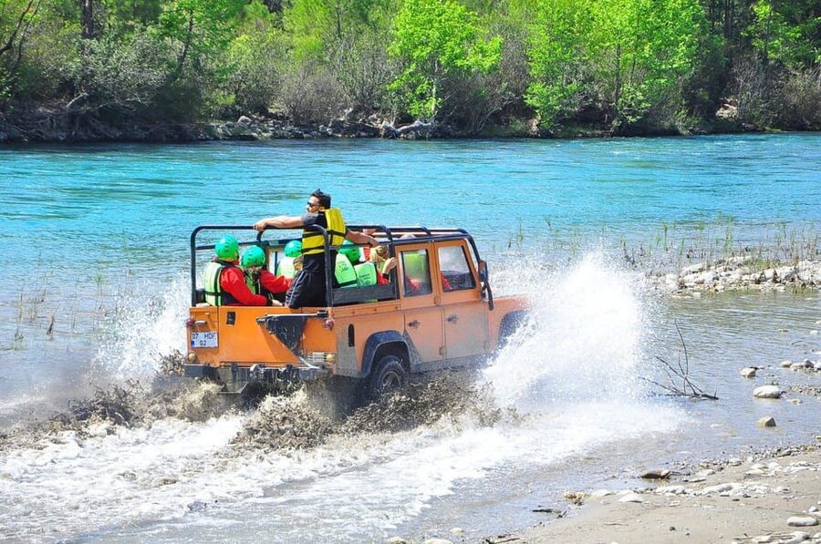 Side&Alanya:Rafting,Jeep,Quad/Buggy Safari/Zipline wLunch - ATV riding through mud and rough ground