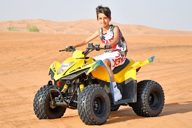 Sunset Desert Safari Quad bike Camel ride Sand Board & BBQ Dinner - Al Awir after sunset: camel ride and camp activities