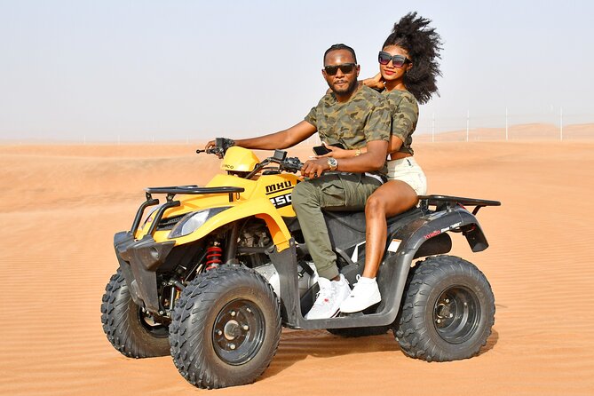 Sunset Desert Safari Quad bike Camel ride Sand Board & BBQ Dinner - Pickup from Dubai or Sharjah