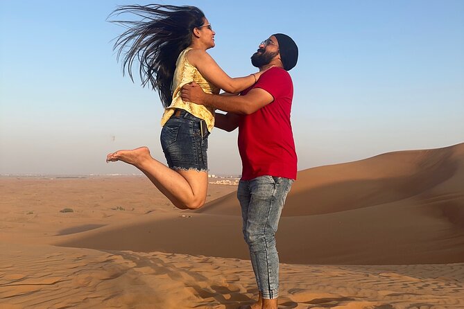 Sunset Desert safari with Camel Ride Sand Board & BBQ Dinner - Al Awir camp: henna, music, and four live shows