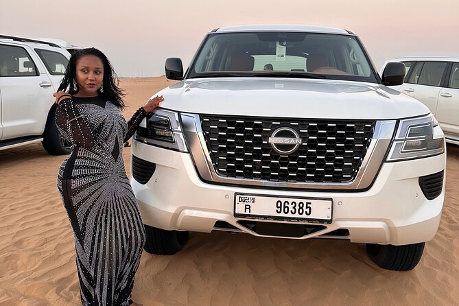 Sunset Desert safari with Camel Ride Sand Board & BBQ Dinner - Dune bashing and sandboarding: the main adrenaline stop