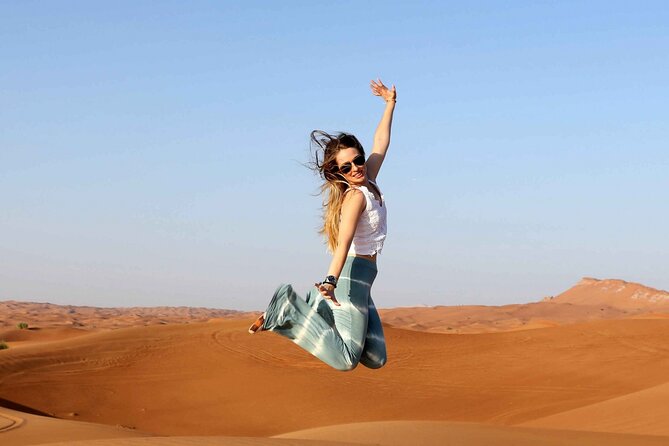 Thrilling Desert Safari Dubai Adventure with Sand Boarding and Barbecue Dinner - Barbecue dinner and evening shows