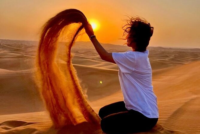 VIP Dubai Desert Safari with Quadbike,Sandboarding & BBQ dinner - Sandboarding on soft red sand