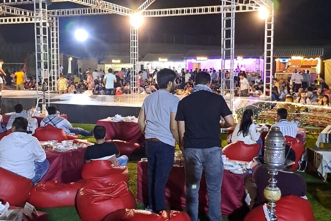 VIP Dubai Desert Safari with Quadbike,Sandboarding & BBQ dinner - Sunset, camels, and a camp with a full evening program