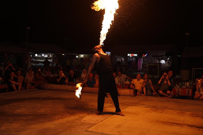 Wow Arabian Nights Tours Desert Safari Program with BBQ Dinner - Camel rides and sandboarding slow the pace